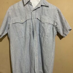 Striped branded lion shirt.